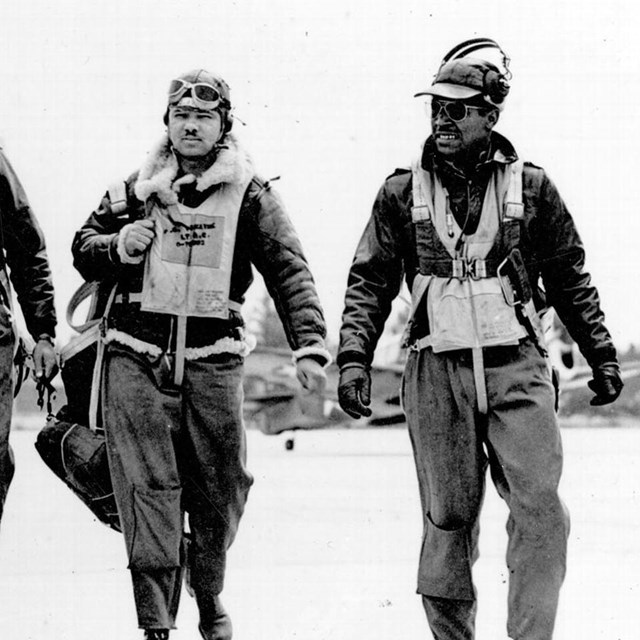 4 african american men in flight suits